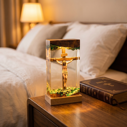 Jesus Crucifix resin lamp lit up in dark room